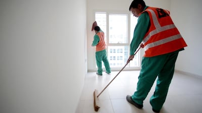 Workers for Al Ryum General Contracting at a project in the Al Nahyan Camp area of Abu Dhabi. Christopher Pike / The National