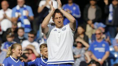 Chelsea's John Terry applauds to supporters after the Premier League match between Chelsea and Leicester City at Stamford Bridge stadium in London, Sunday, May 15, 2016. (AP Photo/Frank Augstein)