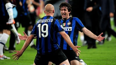 Esteban Cambiasso celebrates Inter's victory with Diego Milito. Getty
