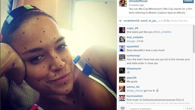 A screenshot of Michelle Rodriguez's selfie on Instagram. The black dots, a technique used for creating special effects.