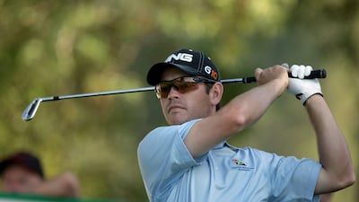 South Africa's Louis Oosthuizen eyes the ball after playing a shot on the 16th hole during the third day of the Dubai Desert Classic golf tournament in the Gulf emirate on January 31, 2009. Irish teenage prodigy Rory McIlroy grabbed the halfway lead with a 25-foot eagle putt on the last. AFP PHOTO/KARIM SAHIB *** Local Caption *** 212499-01-08.jpg