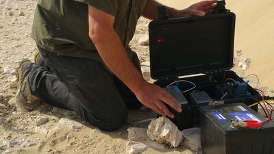 Patrick Chasle of the Institute of Physics of Rennes prepares an experiment.