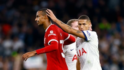 Liverpool's Joel Matip is consoled by Tottenham Hotspur's Richarlison. Reuters