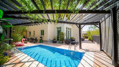 The pool area is snug and shaded. Courtesy LuxuryProperty.com