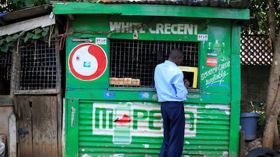 M-Pesa mobile money transfer at a Safaricom agent stall in Nairobi, Kenya. The world is heading into a cashless future. Reuters