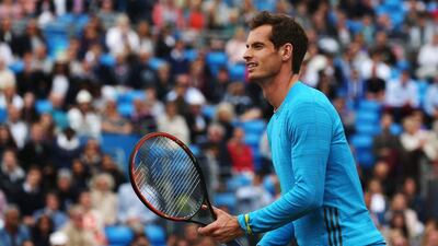 Andy Murray plays in a 'Rally for Bally' charity event on June 15, 2014 at the Queen's Club in London, England. Matthew Stockman / Getty Images