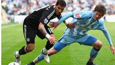 Ricardo Quaresma, left, evades a challenge by Coventry's Aron Gunnarsson as Chelsea escape an FA Cup shock at the Ricoh Arena.