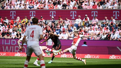 Kingsley Coman of Bayern Munich scores his team's first goal against Cologne. Getty