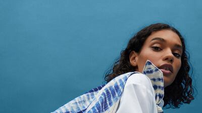 A tie-dyed bag from the H&M Upcycled Accessories collection. Courtesy H&M