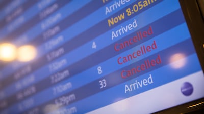 Poor weather conditions and a staffing crisis caused by Covid-19 cancelled thousands of flights at the weekend. Reuters