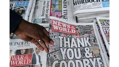 A reader criticises standards at News of the World and its parent company News Corp. Carly Court / AFP