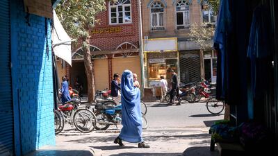 An Afghan woman is burqa-clad in the streets of Herat. AFP