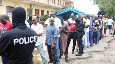 Police question detained Muslim retail traders on December 17, 2017 in Libreville following a knife attack on two Danish nationals. Steve Jordan / AFP