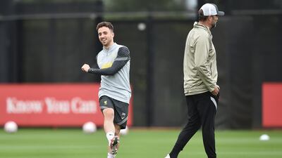 Diogo Jota passes the ball at training. Getty