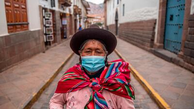 Marcosi, an Andean woman, poses for a picture as she talks with AFP in the city of Cusco, southern Peru, during the coronavirus pandemic. AFP