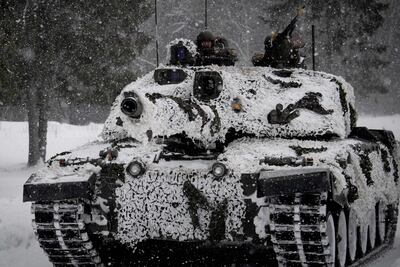 A British Challenger tank takes part in a drill at the Tapa Estonian army camp near Rakvere on February 5, 2022, as part of Nato's 'enhanced forward presence' . AFP