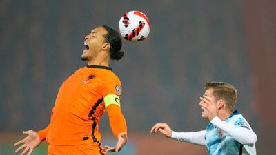 Netherlands' Virgil van Dijk, left, competes with Norway's Alexander Sorloth. AP Photo