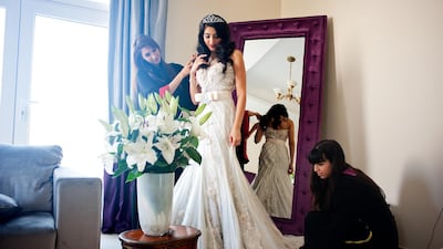 A bride on her wedding day. Brides in the Gulf tend to wear long, white gowns. Getty Images