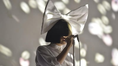 Although she now performs unmasked, Australian singer-songwriter Sia spent years wearing a face-obscuring wig onstage. AFP