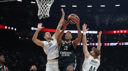 (L-R) Dubai Basketball's Filip Petrusev, Real Madrid's Walter Tavares and Dubai Basketball's Thomas Walkup in action during the EuroLeague Basketball SuperCup semi-finals match betweenReal Madrid and Dubai Basketball in Abu Dhabi, United Arab Emirates, 18 September 2026. EPA / ALI HAIDER