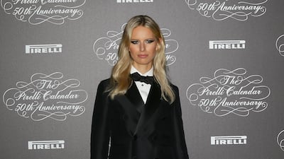 Karolina Kurkova wore a Dsquared tuxedo jacket over leather shorts to attend the Pirelli Calendar 50th Anniversary event on November 21, 2013 in Milan, Italy. Getty Images