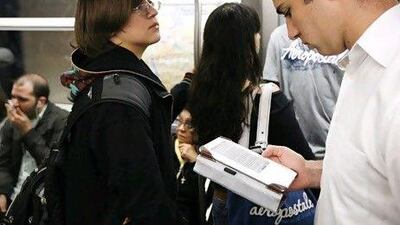 Amazon's Kindle Fire cheaper price tag compared with the Apple iPad tablet has won it loyal users in the US. Lucas Jackson / Reuters