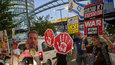 Supporters of Israeli hostages held in the Gaza Strip attend a rally demanding their release from Hamas captivity and calling for an end to the war, in Tel Aviv. AP