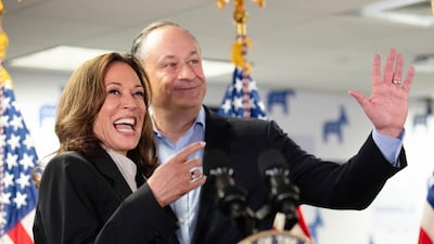 Vice President Kamala Harris and her husband Doug Emhoff address staff at her campaign headquarters in Delaware. AP