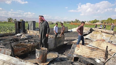 The remains of a home where several Pakistani farmers were killed in a fire in the town of Shuna in Jordan. AFP