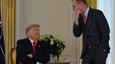 US President Donald Trump speaks with US acting Chief of Staff Mick Mulvaney after his meeting with Nato Secretary General Jens Stoltenberg at Winfield House, London. AFP