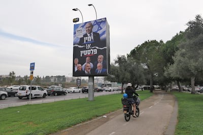 An election billboard, featuring an image of Israeli Prime Minister Benjamin Netanyahu, carries a message criticising Israel's Arab politicians, in Jerusalem. EPA