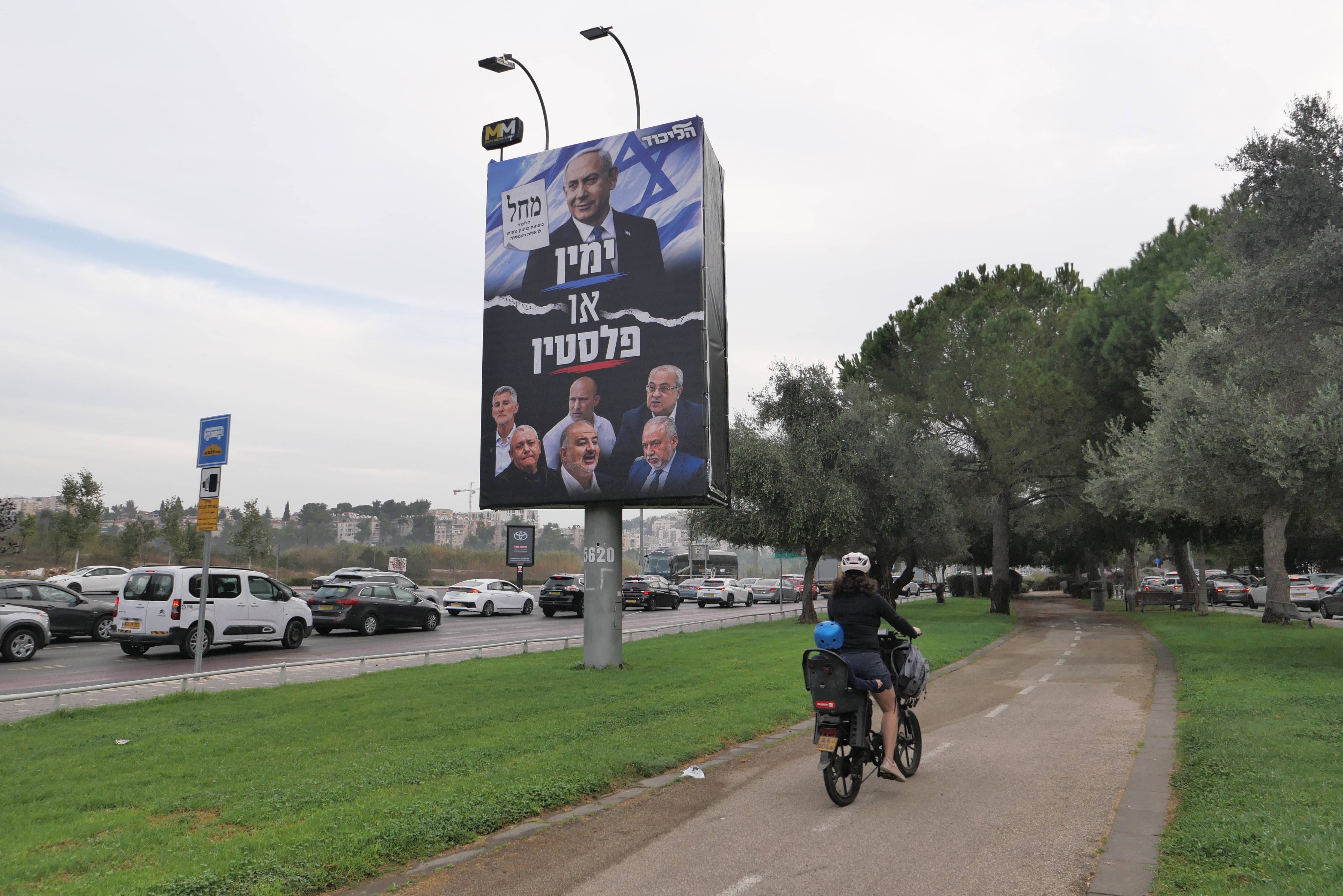 An election billboard, featuring an image of Israeli Prime Minister Benjamin Netanyahu, carries a message criticising Israel's Arab politicians, in Jerusalem. EPA
