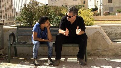 Amos Gitai, right, in West of the Jordan River. Courtesy Amos Gitai