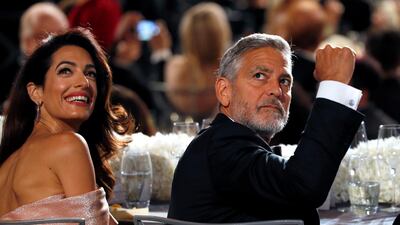 Actor George Clooney and his wife Amal at the AFI awards in Los Angeles in June. Mario Anzuoni / Reuters