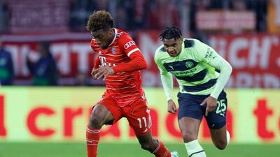 Bayern Munich's Kingsley Coman breaks away from Manchester City's Manuel Akanji. Reuters
