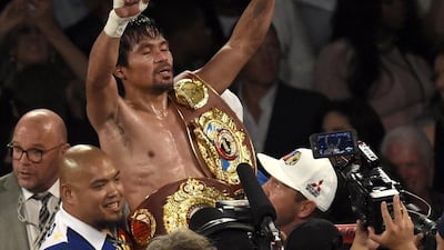 Manny Pacquiao of the Philippines celebrates after defeating Timothy Bradley of the USA in their WBO International Welterweight bout at the MGM Grand Garden Arena in Las Vegas, Nevada, USA, 09 April 2016. EPA/JOHN G. MABANGLO