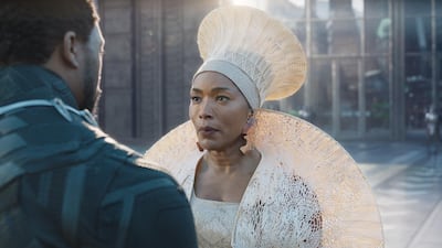 Chadwick Boseman, left, and Angela Bassett in a scene from "Black Panther." AP