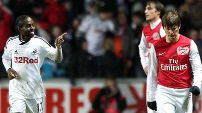 Nathan Dyer, left, was man of the match for Swansea City in the Swans' 3-2 victory over Andrey Arshavin, right, and Arsenal.