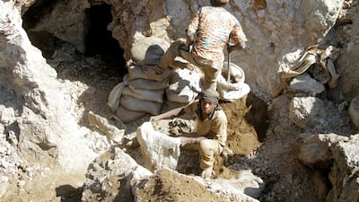 Artisanal miners work at Tilwizembe, a former industrial copper-cobalt mine outside Kolwezi, in the south of Democratic Republic of Congo. The bulk of rare earth mining is done in dangerous and environmentally damaging conditions. Reuters