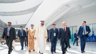 Sheikh Mohammed bin Zayed, Crown Prince of Abu Dhabi and Deputy Supreme Commander of the UAE Armed Forces, centre, and Nursultan Nazarbayev, President of Kazakhstan, second right, attend the opening ceremony of Astana International Financial Centre. Seen with Sheikh Mansour bin Zayed , UAE Deputy Prime Minister and Minister of Presidential Affairs. All photos Crown Prince Court - Abu Dhabi