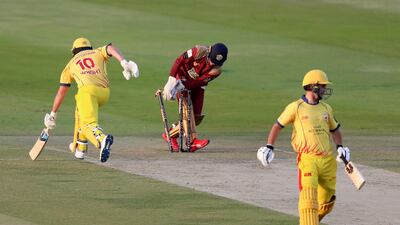 Team Abu Dhabi's Luke Wright is run out. Chris Whiteoak / The National
