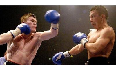 Ricky Hatton's, left, victory over Kostya Tszyu, right, in June 2005 to win the light welterweight title was one of the biggest of his career.