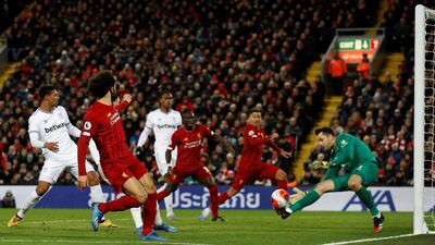 West Ham United's Lukasz Fabianski makes a save from Liverpool's Mohamed Salah. Reuters