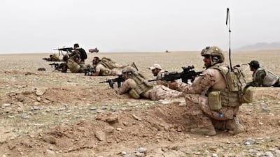 Men from the UAE Armed Forces have been in Afghanistan since 2003, for the most part to support reconstruction. Alex Gardiner, a former British SAS officer, recently joined what should have been a routine patrol in Helmand Province, before events took a grim turn. Above, UAE Special Forces on patrol in Afghanistan with American Special Forces (Green Berets) and Afghan Commandos (ANA) return fire after an intial incoming volley from the Taliban.