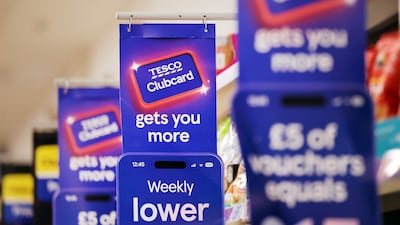 Tesco discounts at a Tesco supermarket in London. Inflation in Britain is expected to climb to 3.3 per cent this year. EPA