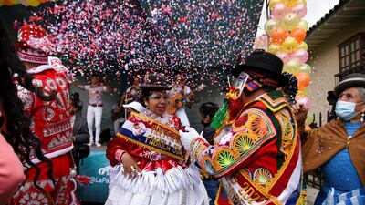 A couple dance during a ceremony to celebrate carnival character Pepino as the carnival season kicks off in La Paz, Bolivia. Reuters