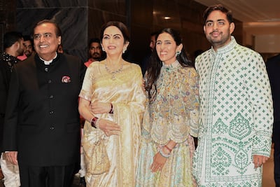 The Ambani family, from left, Mukesh, Nita, Shloka Mehta and Akash. AFP
