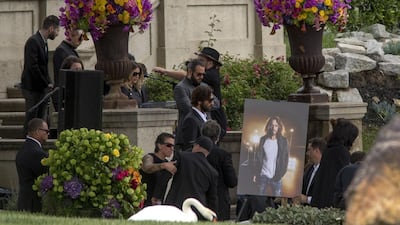 A portrait of Chris Cornell is moved into place for funeral services for Soundgarden frontman Chris Cornell at Hollywood Forever Cemetery on May 26, 2017 in Hollywood, California. David McNew/Getty Images/AFP
