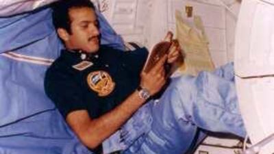 Prince Sultan bin Salman bin Abdul Aziz Al Saud reads the Quran during his 1985 mission as a payload specialist aboard the space shuttle.