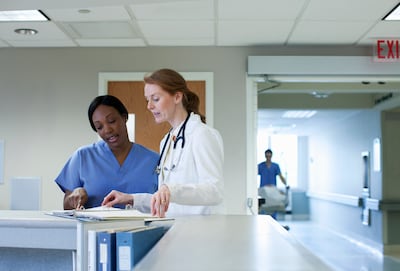 Women account for about 70 per cent of health sector jobs. Getty Images